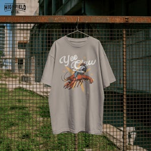 vintage crawfish cowboy illustration for fishing lovers and cajun themed apparel