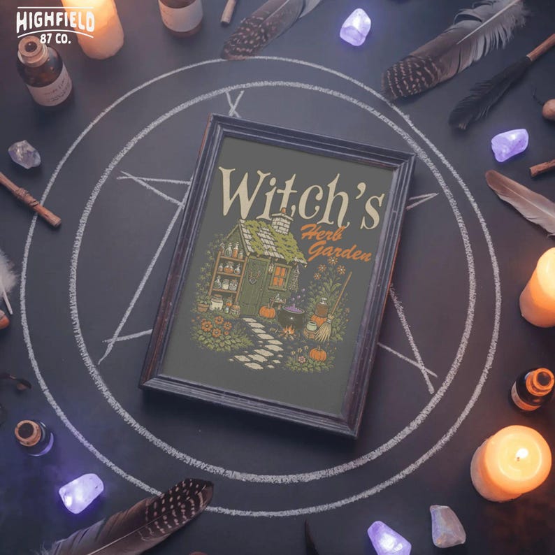 Fall witch shirt PNG showing a witchy cottage with herb garden, stone path, cauldron fire, pumpkins, and Halloween garden details.
