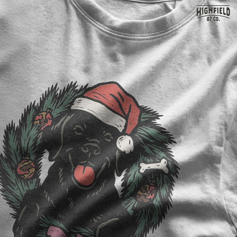 Cute Christmas labrador PNG file featuring black lab in wreath with festive decorations. Great for sublimation or pet lover holiday gifts.