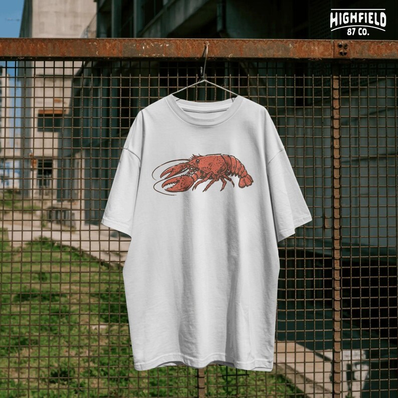 funny crawfish boil shirt design with bold text and seafood graphic, front and back PNG