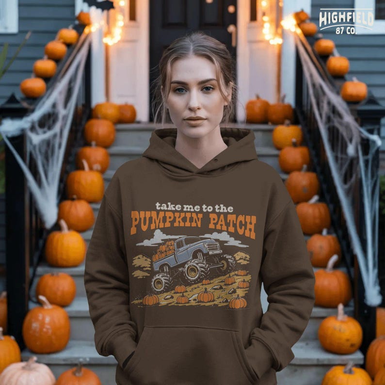 Fall shirt PNG featuring Take Me To The Pumpkin Patch text with a blue monster truck, pumpkins, and harvest season artwork.