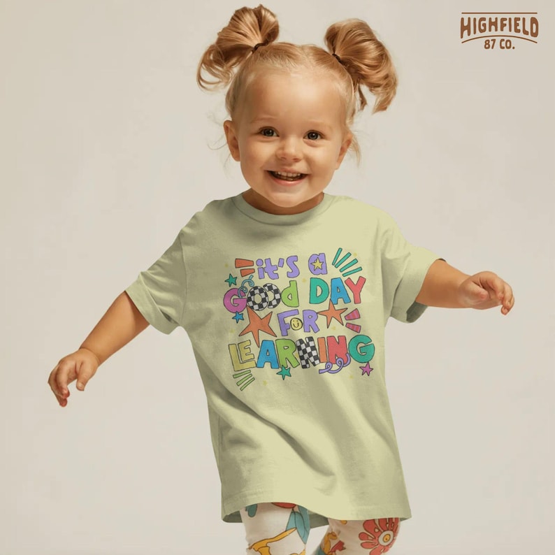 Cute classroom themed PNG featuring It’s a Good Day for Learning text in playful multicolor letters for school apparel designs.