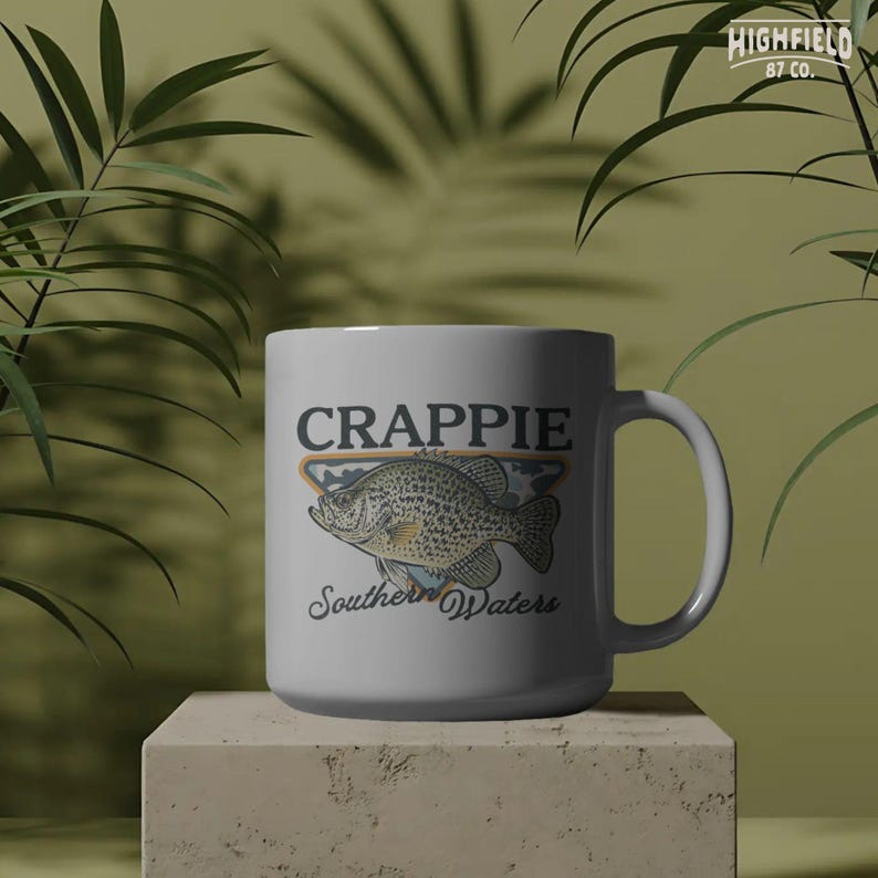 Lake fishing PNG featuring a crappie fish with detailed fins and scales, Southern Waters phrase, and outdoor badge style for fisherman gifts.