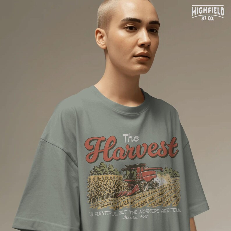 Agriculture PNG featuring a red combine harvesting corn with fall harvest and Christian farmer shirt design style.