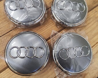 thumbnail image 2 of OEM Audi 61mm Grey Chrome Wheel Center Hub Cap Emblems – 4-Piece Set (8W0601170JG3) 2 of 5