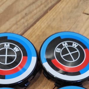 2x56mm BMW carbon logo