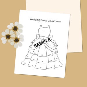 Può includere: Un disegno in bianco e nero di un abito da sposa con i numeri da 1 a 25 sull'abito. Il testo "Wedding Dress Countdown" è in cima alla pagina.