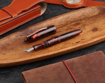Handcrafted fountain pen with titanium nib. Made of extraordinary copper resin