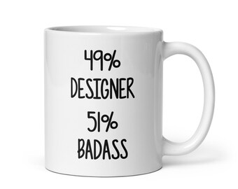 May include: White ceramic mug with black text that reads "49% Designer 51% Badass".