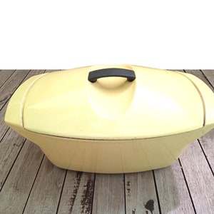 Old grapefruit yellow enameled cast iron casserole dish Raymond Loewy for LE CREUSET from 1958 made in France