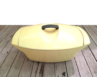 Old grapefruit yellow enameled cast iron casserole dish Raymond Loewy for LE CREUSET from 1958 made in France