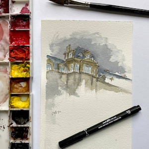 May include: Watercolour painting of a building with a grey sky. The building is a light brown colour with a dark grey roof. The building has lots of windows and a few chimneys. The painting is signed "Cfezo" in the bottom left corner.