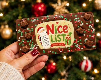 Nice list christmas Belgian Chocolate : Topped with white chocolate jazzles, Milky way stars and  Christmas sprinkles.