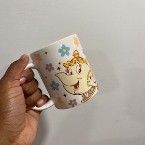 Disney's Beauty and the Beast A New Musical Gold Reflective Coffee Mug Cup