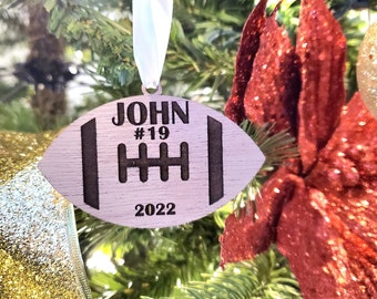Football ornament with name, number, and year.  Custom wood football ornament