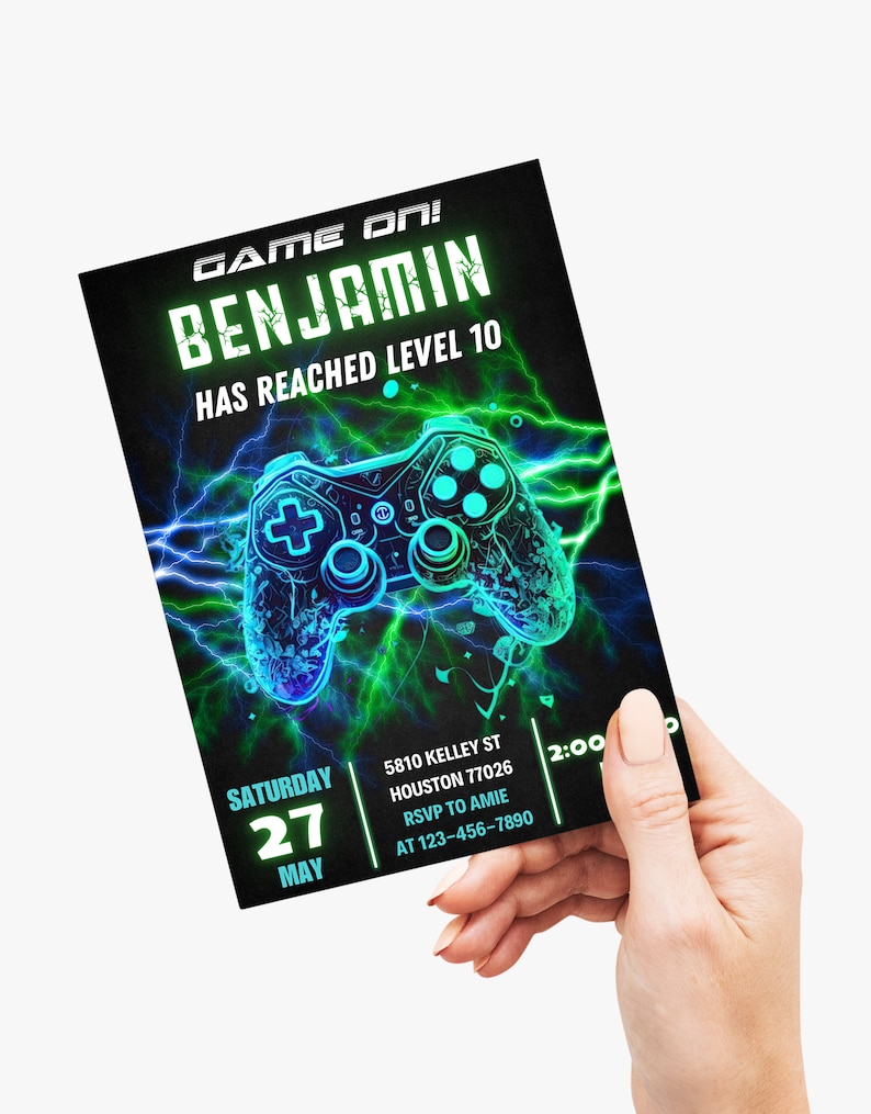 May include: A green and blue video game controller with lightning bolts on a black background. The text "GAME ON! BENJAMIN HAS REACHED LEVEL 10" is at the top of the invitation. The text "SATURDAY 27 MAY" is in the bottom left corner. The text "5810 KELLEY ST HOUSTON 77026 RSVP TO AMIE AT 123-456-7890 2:00" is in the bottom right corner.