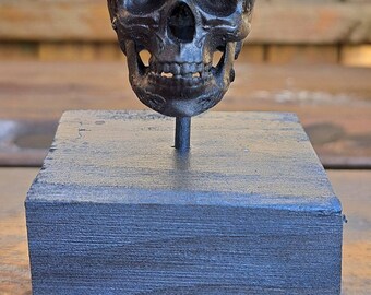 Handmade ragnar skull on a plinth