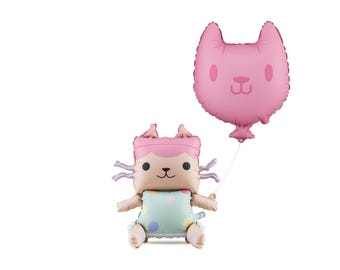 May include: A pink cat-shaped foil balloon floats above a matching cat-themed character balloon. The character balloon is wearing a light green outfit with colorful polka dots. The balloons are designed for a birthday or party.