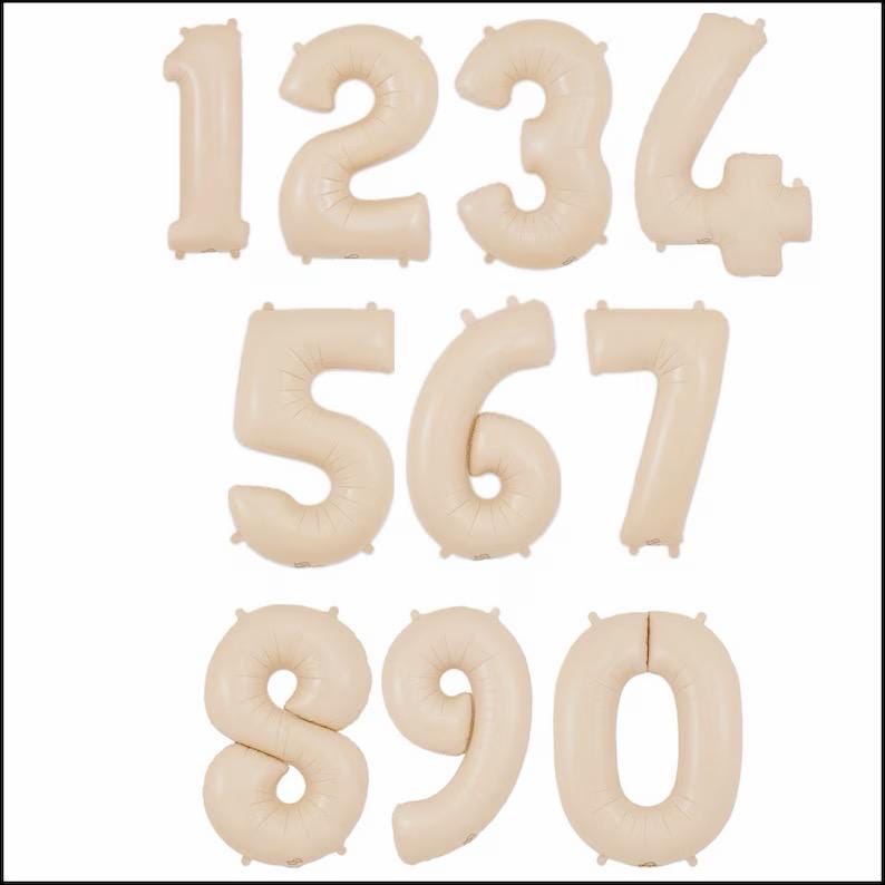 May include: A collection of beige number balloons, including the numbers 0 through 9. Each balloon is inflated and has a matte finish. These balloons are suitable for birthday parties, anniversaries, or other celebratory events.