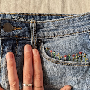 mid rise denim shorts with pocket flowers | hand embroidered