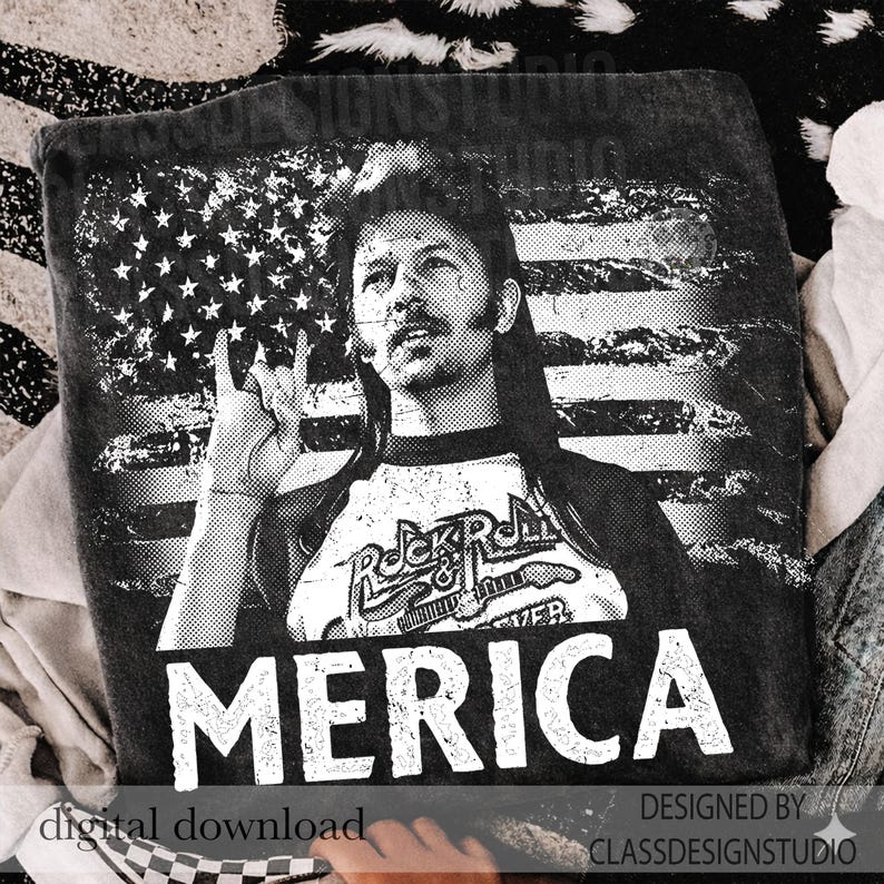 May include: Black graphic t-shirt featuring a portrait of a man with a mullet and the American flag in the background. The shirt has the words "Rock & Roll Forever" and "Merica" printed on it. The design is distressed.