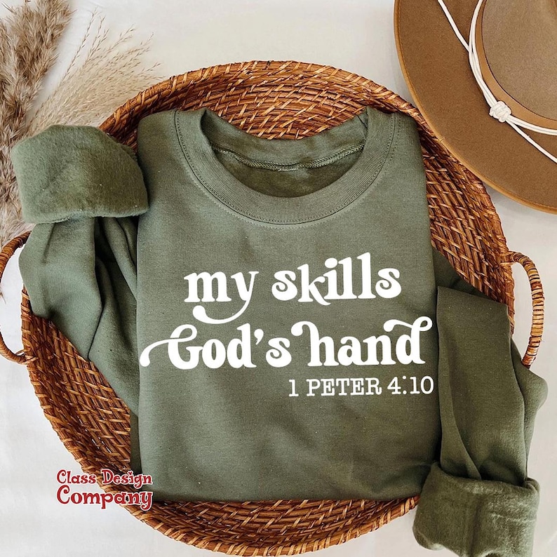 May include: A green sweatshirt with the text "my skills God's hand 1 Peter 4:10" in white.