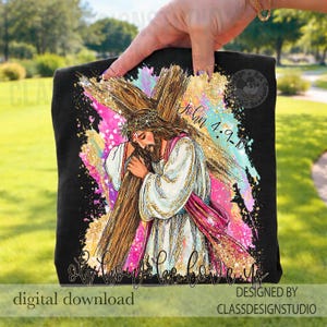 May include: Black t-shirt featuring a religious illustration of Jesus carrying a cross, with the text "John 4:9-10" and "Oh how He loves us." The design includes pink, gold, and blue brushstrokes. "Digital download" and "Designed by ClassDesignStudio" are also visible.