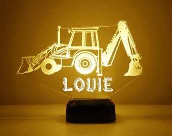 May include: A white silhouette of a digger with the name "LOUIE" written in a stylised font below. The digger is illuminated from behind, casting a warm yellow glow.
