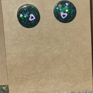 Hearts in glittery space stud earrings