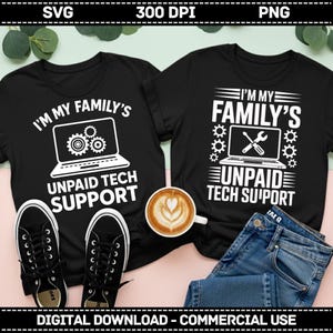 May include: Two black t-shirts with white text: "I'M MY FAMILY'S UNPAID TECH SUPPORT". One shirt features a laptop graphic with gears, the other a laptop with a wrench and screwdriver. The image also includes black trainers, a coffee cup, and a pair of jeans.