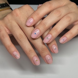 Chrome Star with Gems Gel Press On Nails JosieGelNails | Chrome Nails, Spring Nails, Fake Nails, Celestial Nails, Emo Nails, Gem Nails