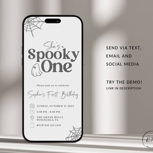 May include: A digital invitation for a spooky themed first birthday party. The invitation features a ghost, spiderwebs, and the text "She's a Spooky One". The invitation includes the date, time, location, and RSVP information.