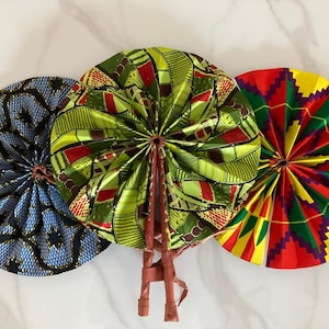 Set of 3 Ankara fabric  folding handmade fan with leather handle.
