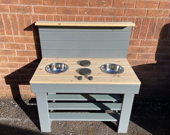 Double bowl mud kitchen with 'cooker top'