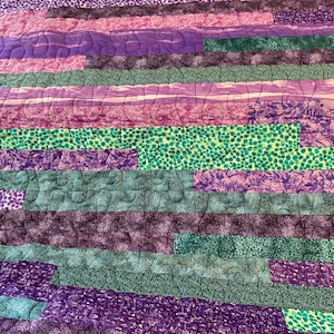Purple blanket, purple quilt, jelly roll quilt, stripe quilt, green quilt, green blanket