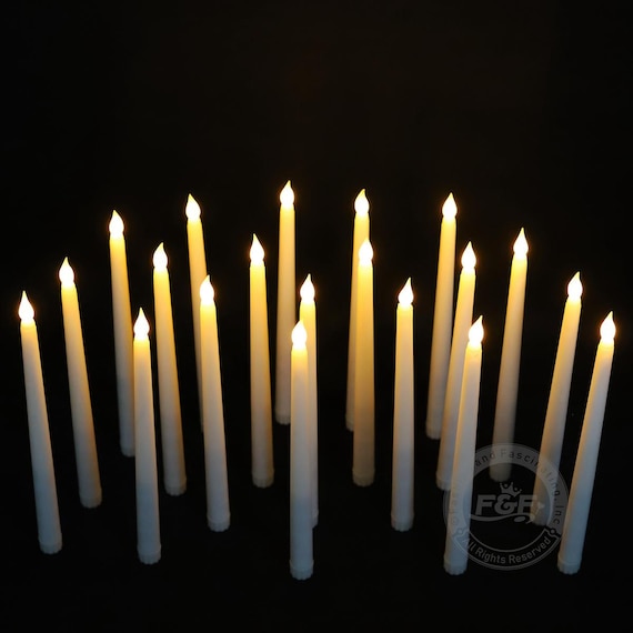 WYZworks 12 Pack, 11 Ivory Flameless LED Taper Flickering Candles Lights, Bottom On/Off Button (no Remote), Battery Operated Electric Long Tall Candlesticks for Christmas Candelabra Wedding Window WYZworks 12 Pack, 11 Ivory Flameless LED Taper Flickering Candles Lights, Bottom On/Off Button (no Remote), Battery Operated Electric Long Tall Candlesticks for Christmas Candelabra Wedding Window