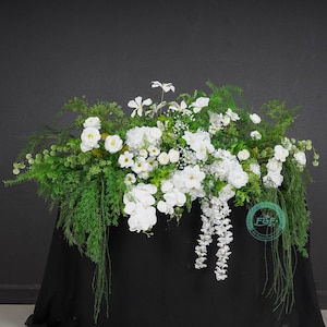 55″ x 43.3″ Artificial Flower Backdrop Floral Row Centerpieces Welcome Area Floral Arrangement-White Flowers With Green Leaves