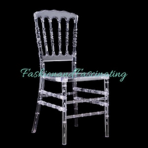 May include: A clear plastic chair with a high back and a simple design. The chair is made of durable, transparent plastic and has a classic, elegant look.