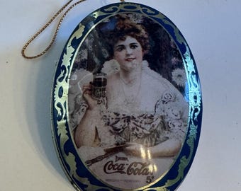Vintage Coca-Cola blikken mini ovale metalen snuisterijdoosje