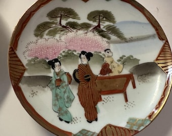 Japanse borden uit de jaren 1920 Takito vintage handgeschilderde set van 2 Geisha Tohika