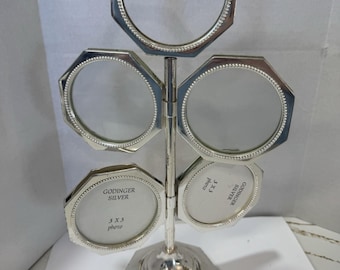 Árvore de fotos giratória vintage banhada a prata. Comporta 10 fotos 3x3. Godinger.