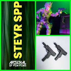 May include: Two black plastic toy guns, one with a black barrel and the other with a silver barrel. The guns are on a white background. The text "STEYR SPP" is in yellow on a green background.