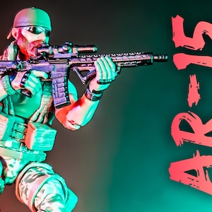 May include: A military action figure in combat gear, holding a rifle with a scope. The figure is in a shooting stance, with the text "AR-15" in red on the right. The background has a teal and red gradient.