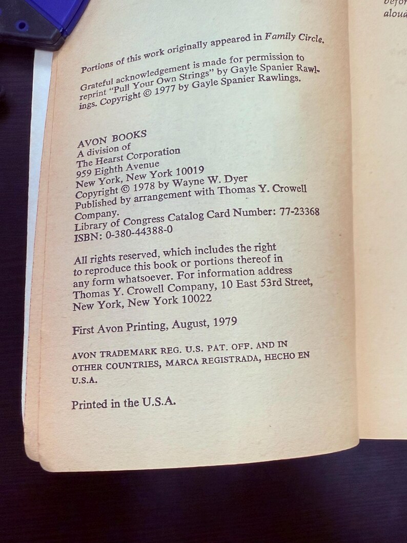 May include: A page from a vintage book with text. The text includes the title "Pull Your Own Strings", copyright information, and the publisher's details: Avon Books, New York. The book was printed in the U.S.A. in August 1979.