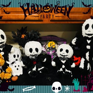 May include: A Halloween party display featuring five white crocheted skeleton figures with black accents. The skeletons are dressed in black suits and ties. The figures are arranged on a shelf with a sign that reads "Halloween Party".