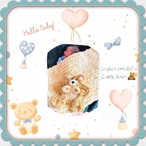 May include: A baby swaddled in a cream-colored crocheted blanket with a teddy bear design. The blanket is decorated with a brown teddy bear with a bow tie. The background features a light blue and white watercolor design with hearts, stars, and the text "Hello Baby!" and "I Love You".