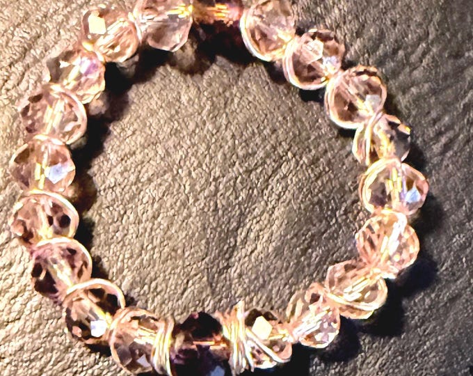 Circular beaded ring with wire wrap. Size 10
