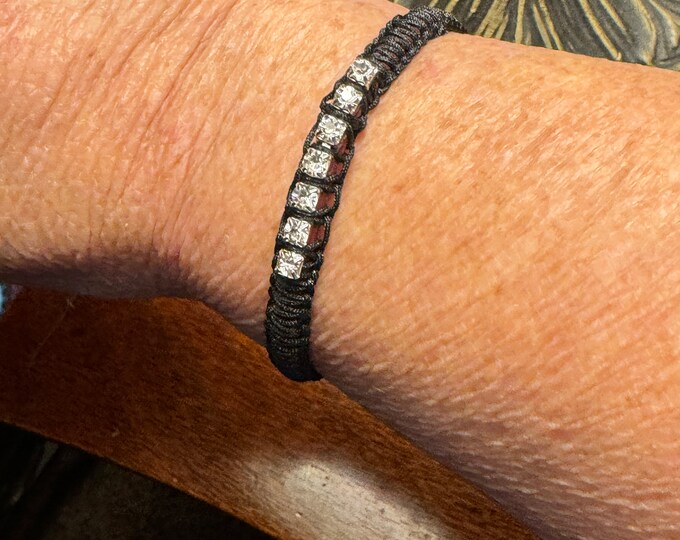 Black Leather macrame bracelet with rhinestones and button closure.