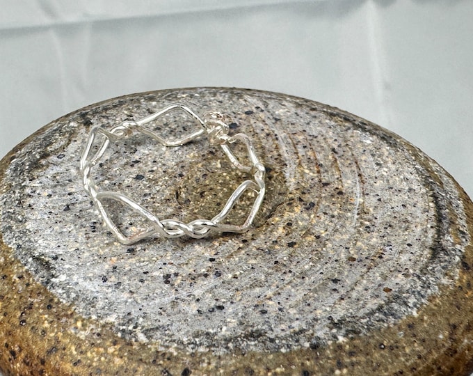Silver wrapped boho ring-triangle shaped ring-small silver twists and triangle ring-size 7 3/4”