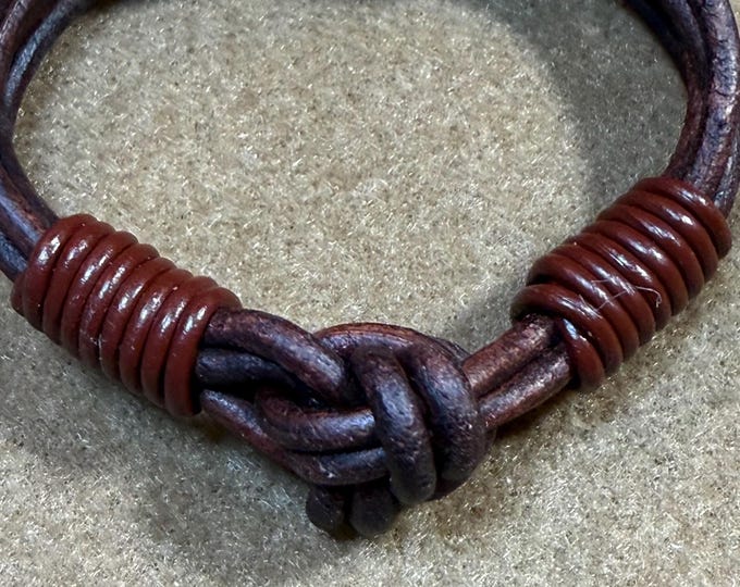 Celtic braided friendship bracelet-Irish leather design-gold hook closure-7 1/2”
